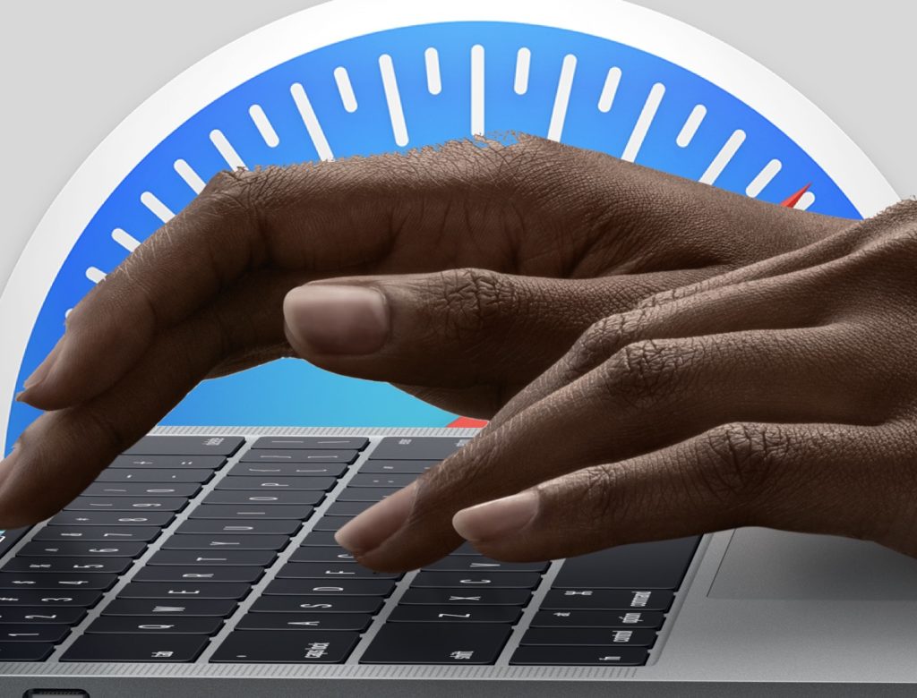 A safari logo and hands on a Mac keyboard