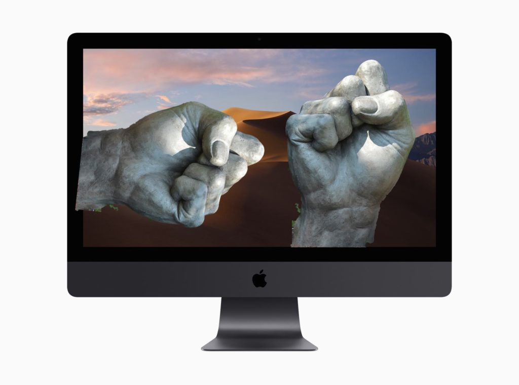 Two fists in a Mac