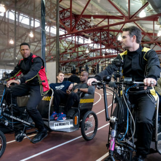 Michael Strahan and Jeff Gordon on rickshaws