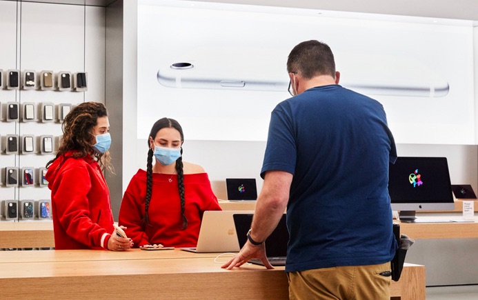 Apple store staff with masks