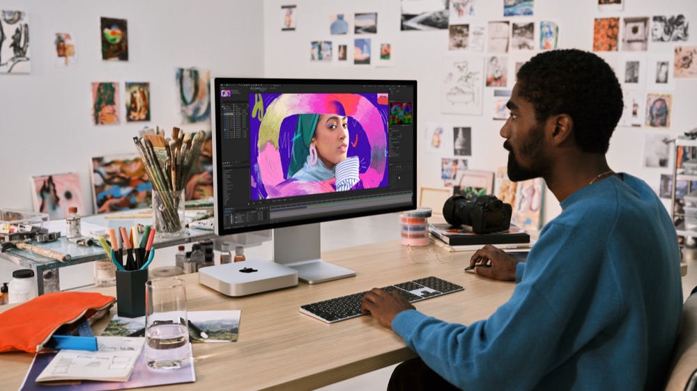 Man with Mac mini